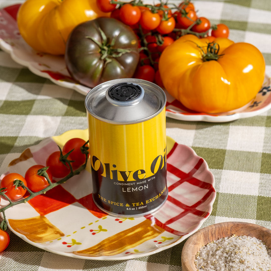 Lemon Extra Virgin Olive Oil on place next to Rosemary sea salt and tomatoes - view 2
