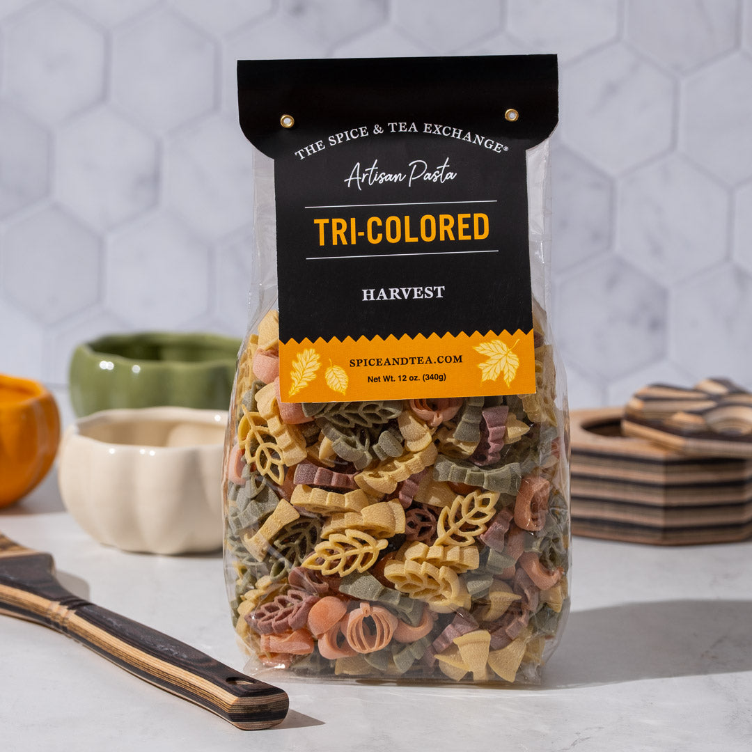Tri- Color Harvest Pasta on kitchen counter with utensils in background